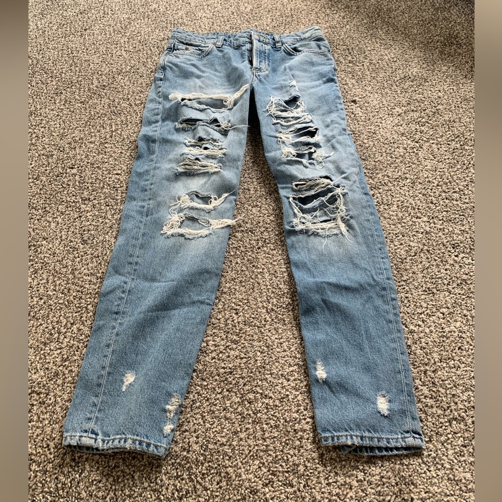Ripped blue jeans